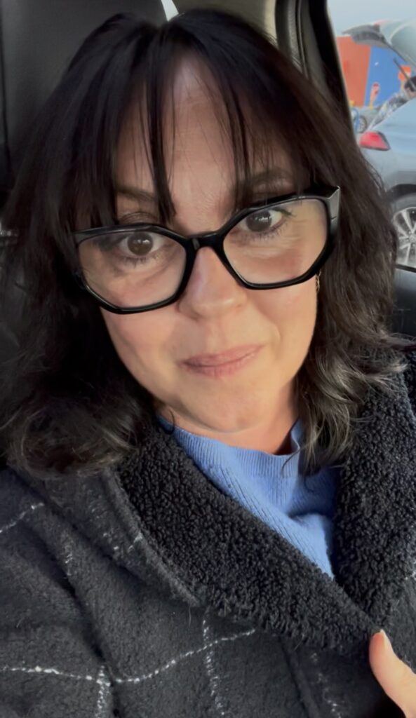 Woman in her 40s reflecting on how to get unstuck in midlife